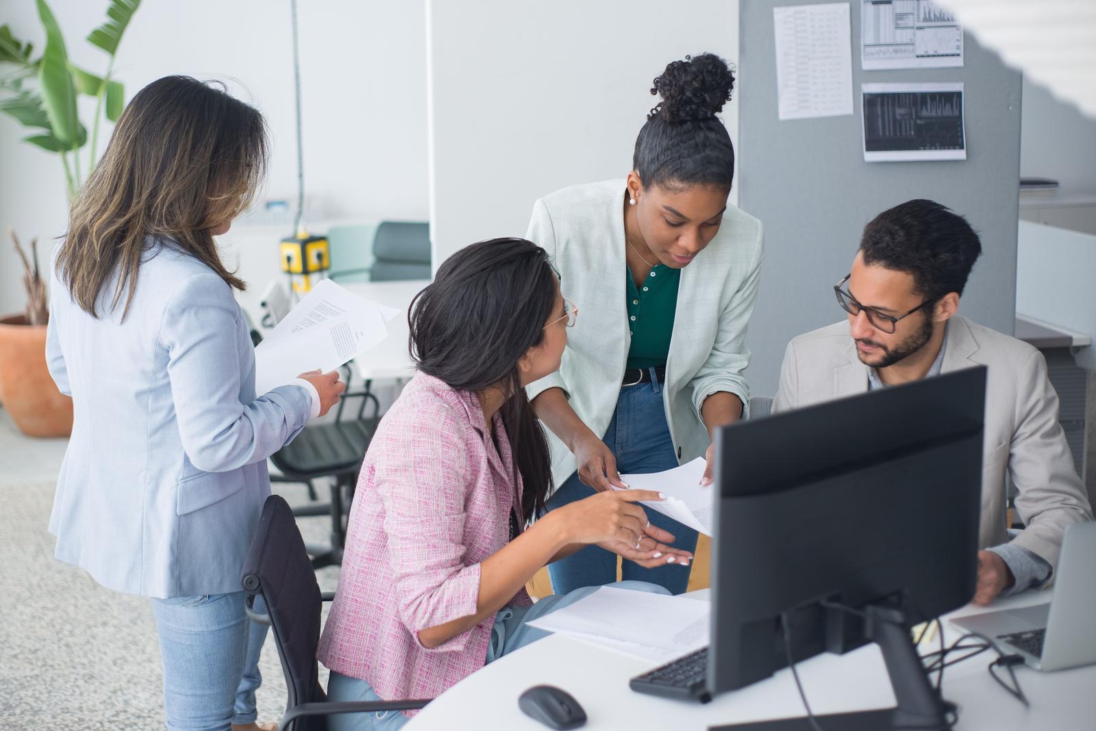 An executive team reviewing the published price