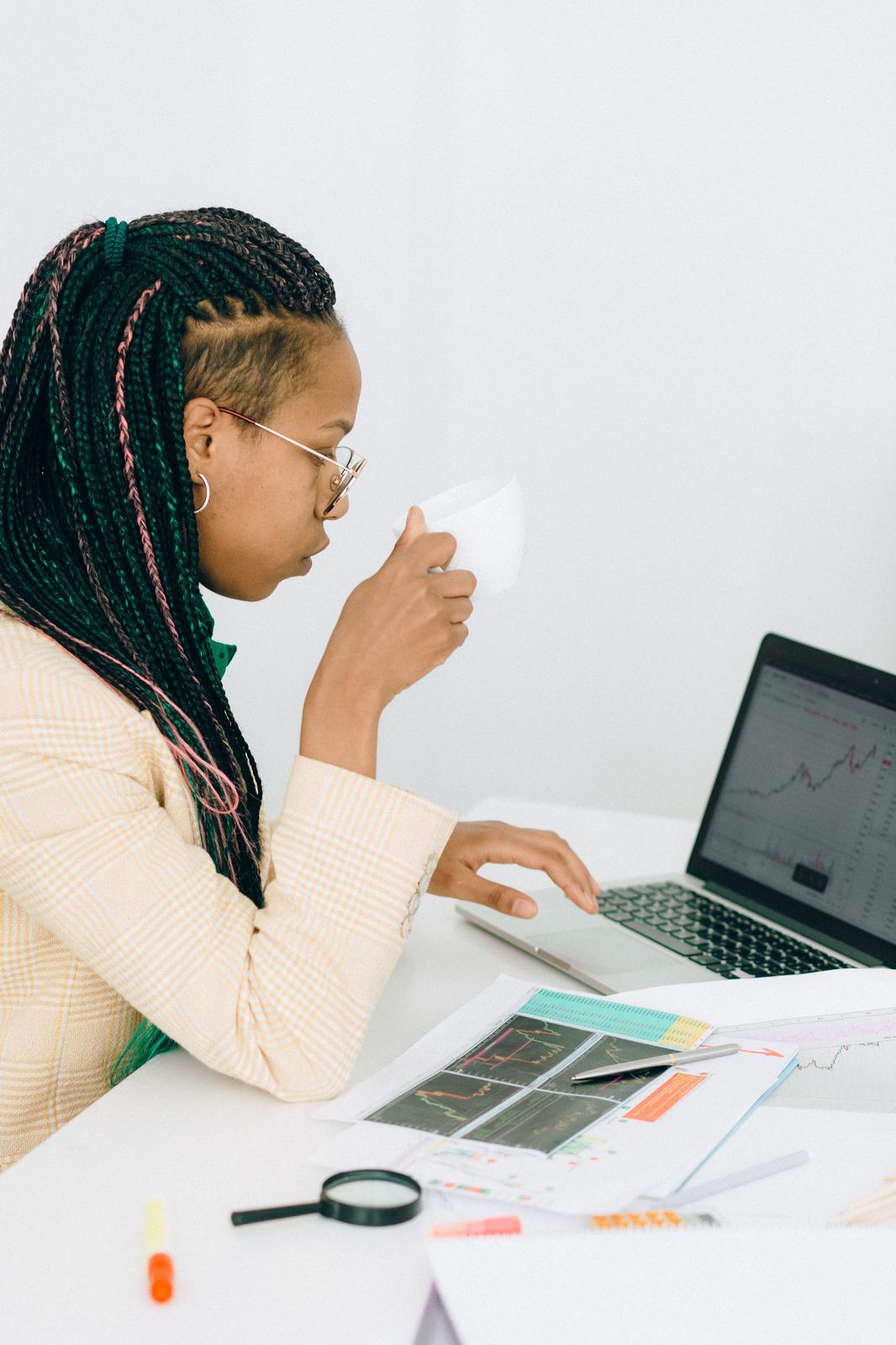 A business specialist reviewing milestone metrics for data driven refund guarantees.